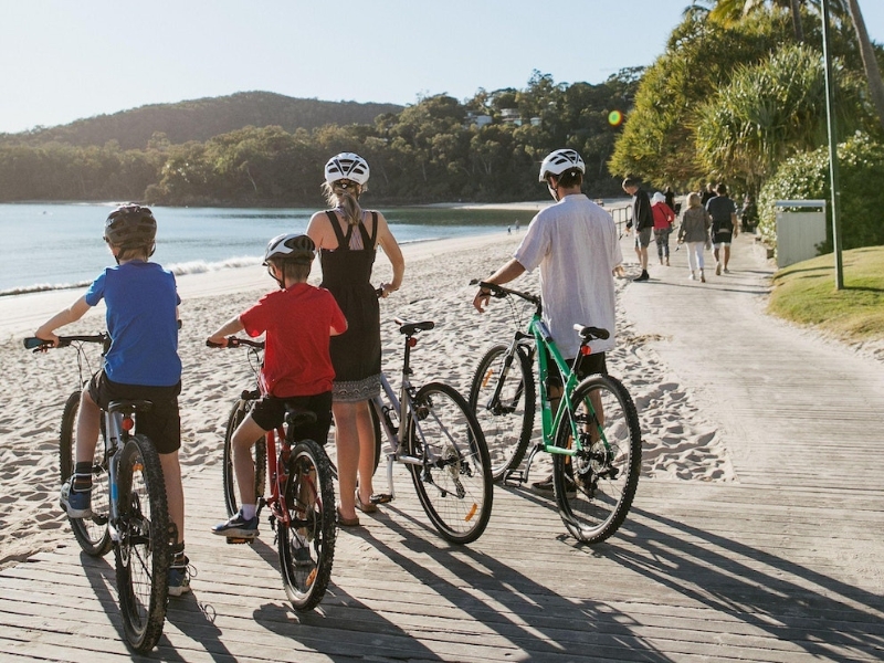 family biking in noosa